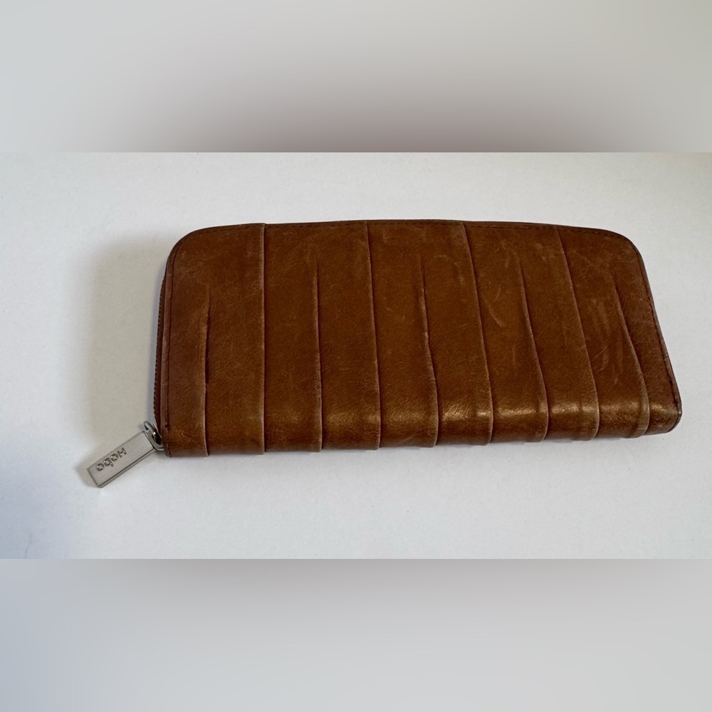 HOBO brown leather zip around wallet.